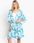 Beach Rose Co. floral print open-front cover-up with a drawstring waist worn by a blonde model over a white tank top