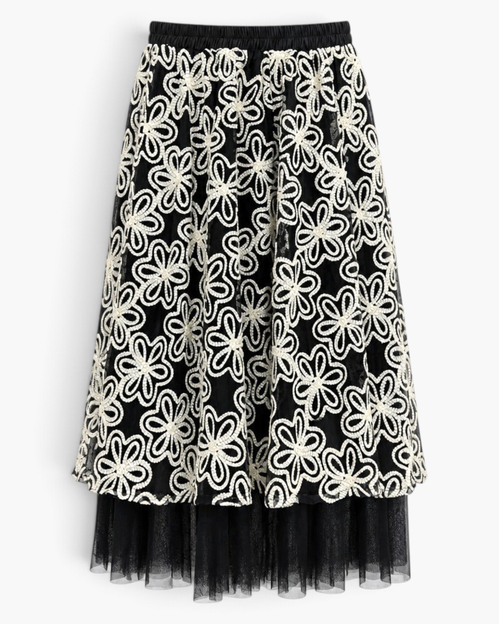 Beach Rose Co. black midi skirt featuring white floral embroidery and a sheer tulle hem with an elastic waistband.