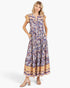 Beach Rose Co. peacock blue floral maxi dress with flutter sleeves, tiered silhouette, and pockets on a model.