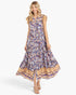 Beach Rose Co. peacock blue floral maxi dress with flutter sleeves, tiered silhouette, and contrasting border print.