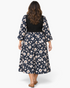 Beach Rose Co. plus size midi dress with black ribbed bodice and navy floral skirt, back view