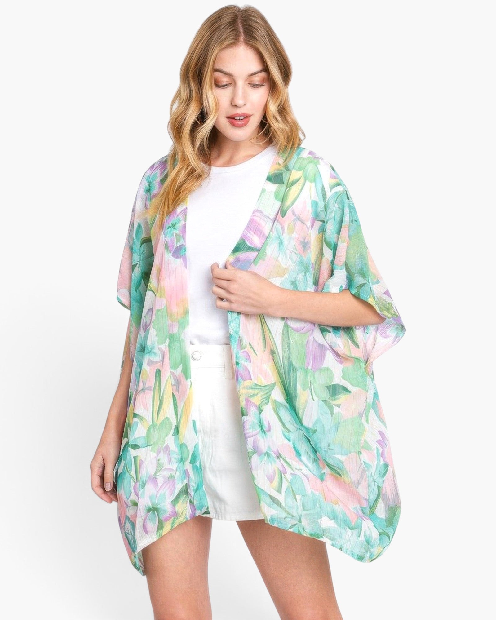 Beach Rose Co. floral print cover-up in lightweight polyester with an open front, worn over a white top and shorts.