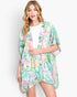 Beach Rose Co. floral print cover-up in lightweight polyester with an open front, worn by a blonde model.