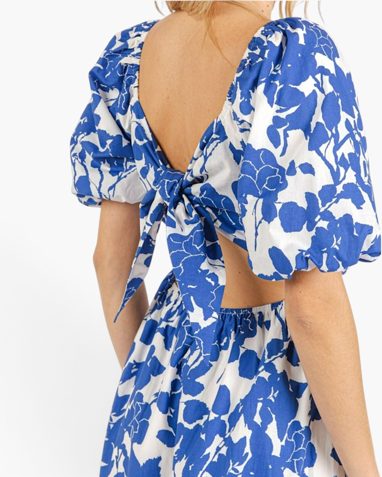 Beach Rose Co. royal blue and white floral cotton maxi dress with puff sleeves and an open back with an adjustable tie