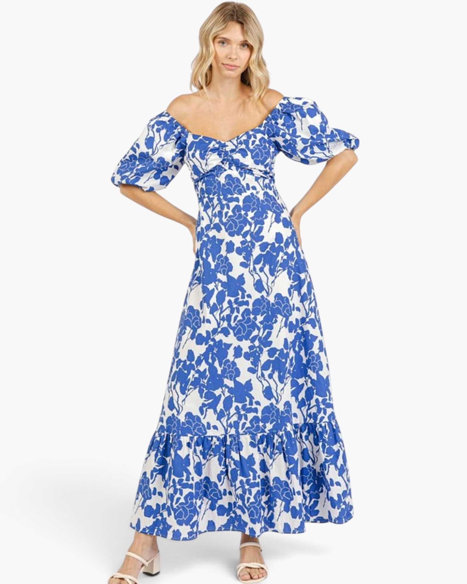 Beach Rose Co. royal blue and white floral cotton maxi dress with puff sleeves, sweetheart neckline, and ruffled hem.