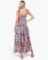Beach Rose Co. dusty blue maxi dress with pink floral print, shoulder ties, and tiered ruffles, back view.