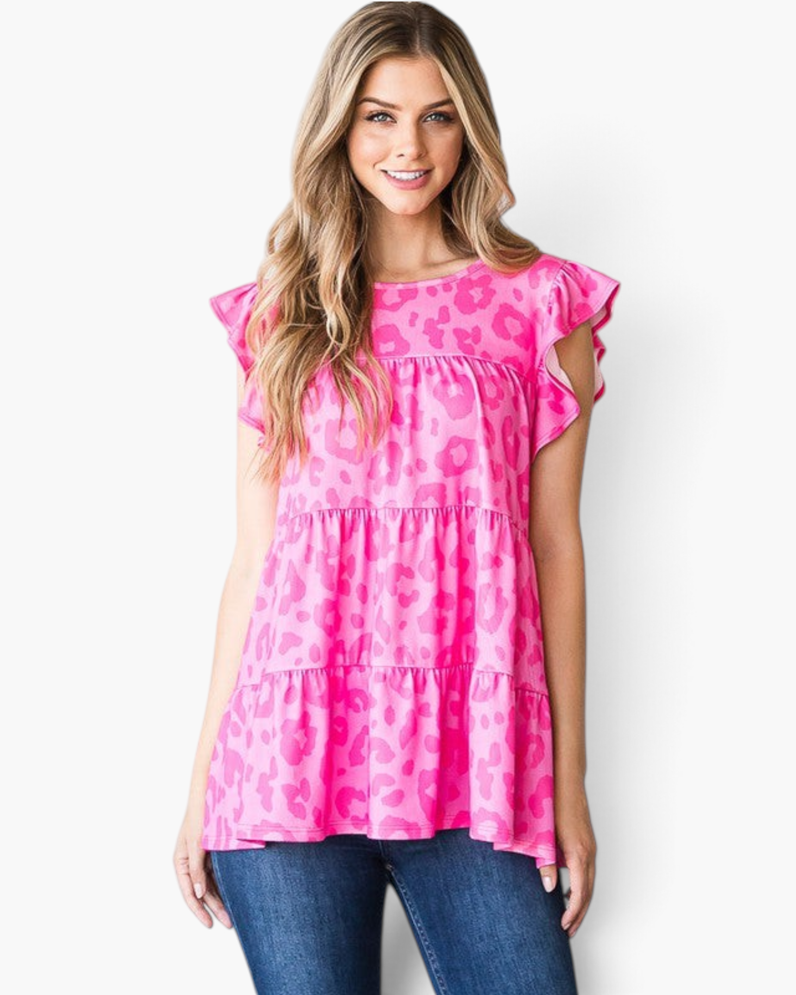 Beach Rose Co. fuchsia leopard print tiered top with flutter sleeves and a round neckline worn by a smiling woman.