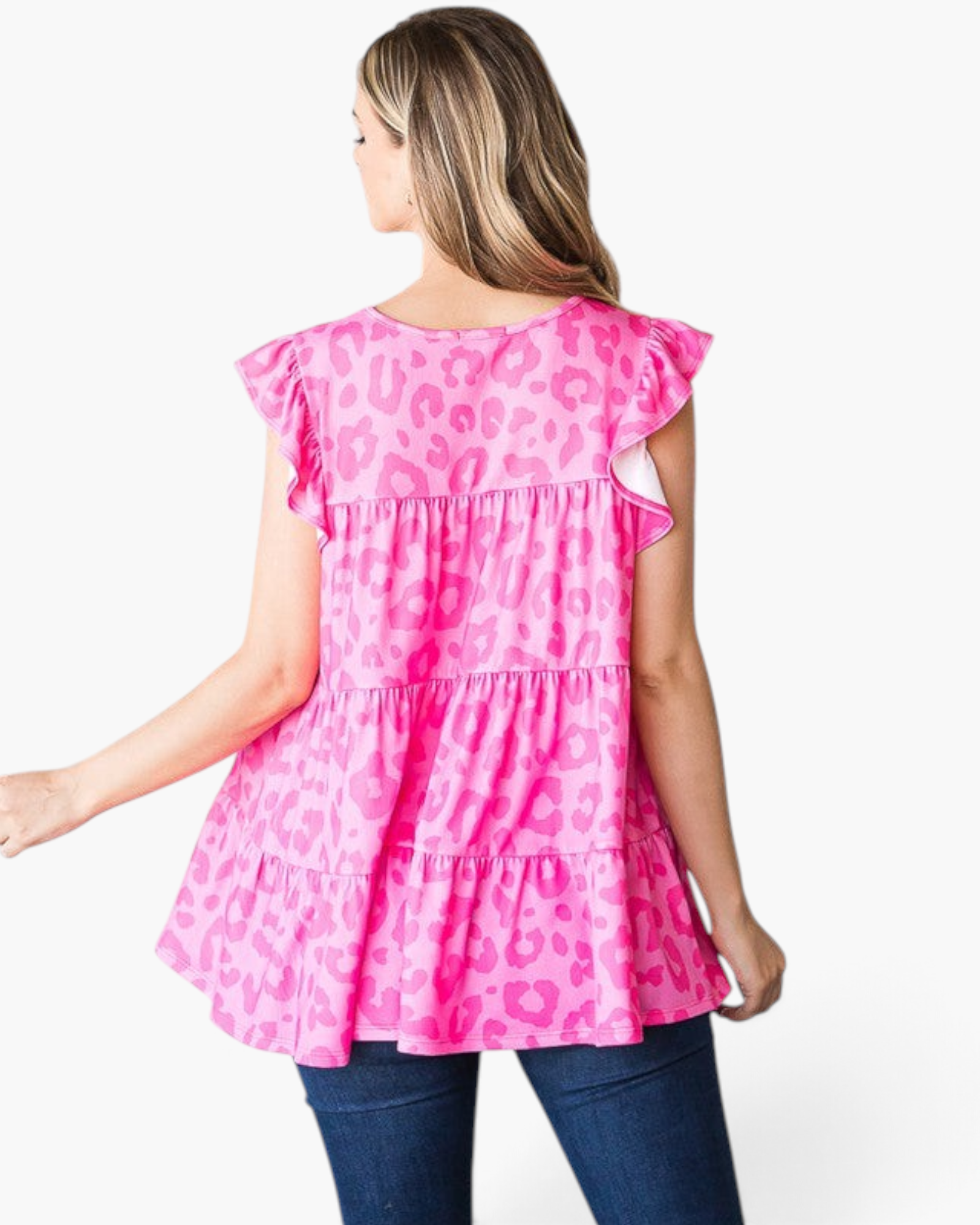Beach Rose Co. fuchsia leopard print tiered top with flutter sleeves and a round neckline, back view on a model.