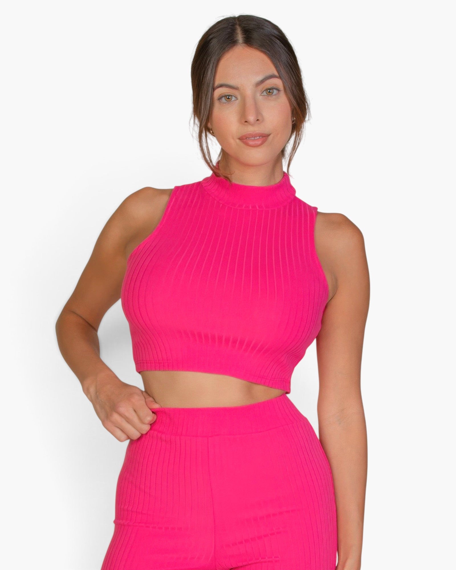 Beach Rose Co. fuchsia ribbed mock neck crop tank top worn by a model against a white background.