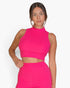 Beach Rose Co. fuchsia ribbed mock neck crop tank top worn by a model against a white background.