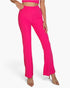 Beach Rose Co. fuchsia ribbed mock neck crop tank top and matching bootcut pants set on a model.