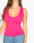 Beach Rose Co. fuchsia ribbed V-neck sleeveless top worn by a woman with long wavy hair