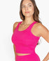 Beach Rose Co. fuchsia ribbed tank top worn by a woman, featuring a form-fitting design and soft stretch fabric.