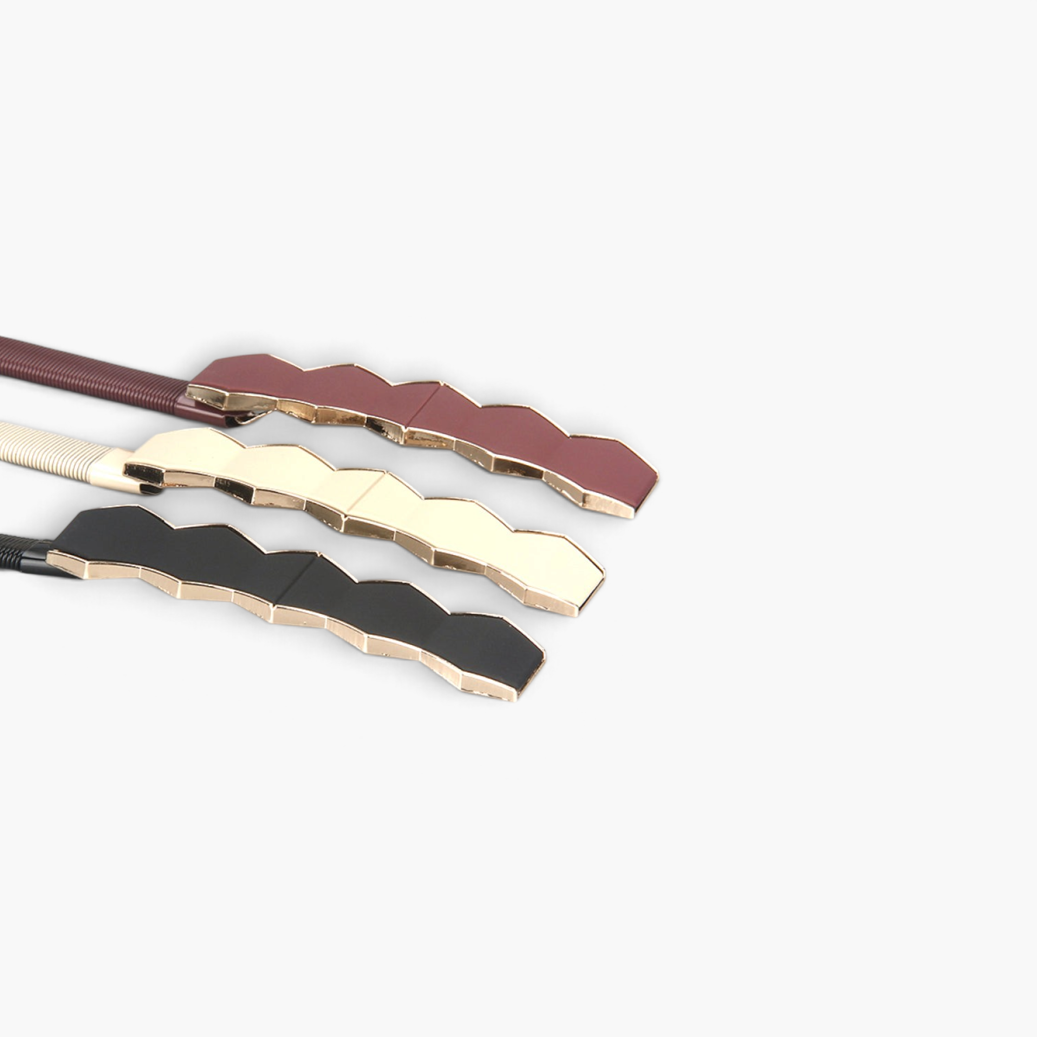 Beach Rose Co. skinny metal waist belts in burgundy, gold, and black with geometric hexagon buckles.