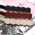 Beach Rose Co. skinny metal waist belts with geometric hexagon buckles in black, burgundy, and beige on a floral base.