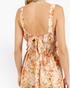 Beach Rose Co. ginger floral wide-leg jumpsuit featuring a smocked waist, gathered bodice, and back tie detail.