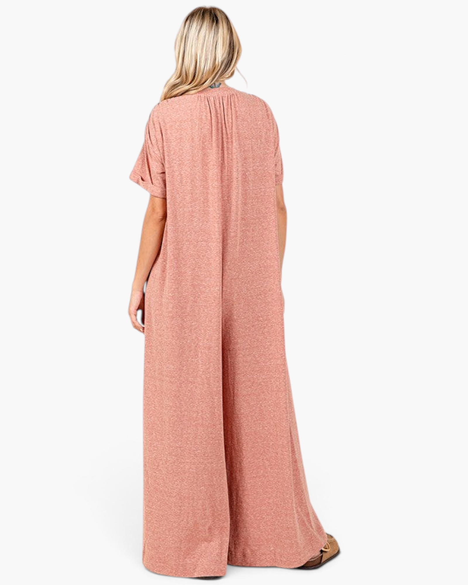 Back view of a Beach Rose Co. ginger wide-leg jumpsuit with short sleeves and a relaxed fit on a blonde model.
