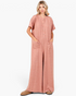 Beach Rose Co. ginger button-front wide-leg jumpsuit with short sleeves and patch pockets on a model