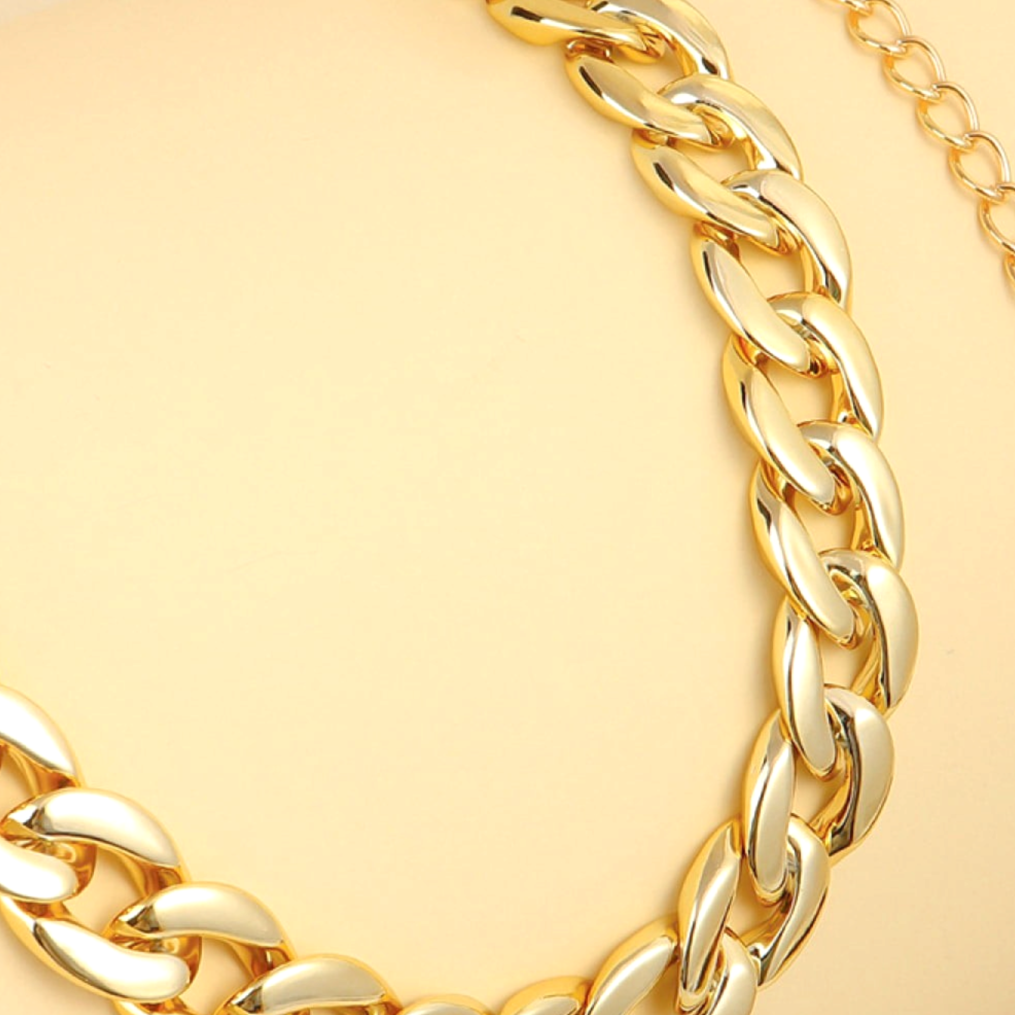 Beach Rose Co. gold-tone acrylic and aluminum adjustable curb chain belt with a delicate extender chain.