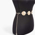 Beach Rose Co. gold metal chain belt featuring circular medallions with embossed lion heads on a black mannequin torso.