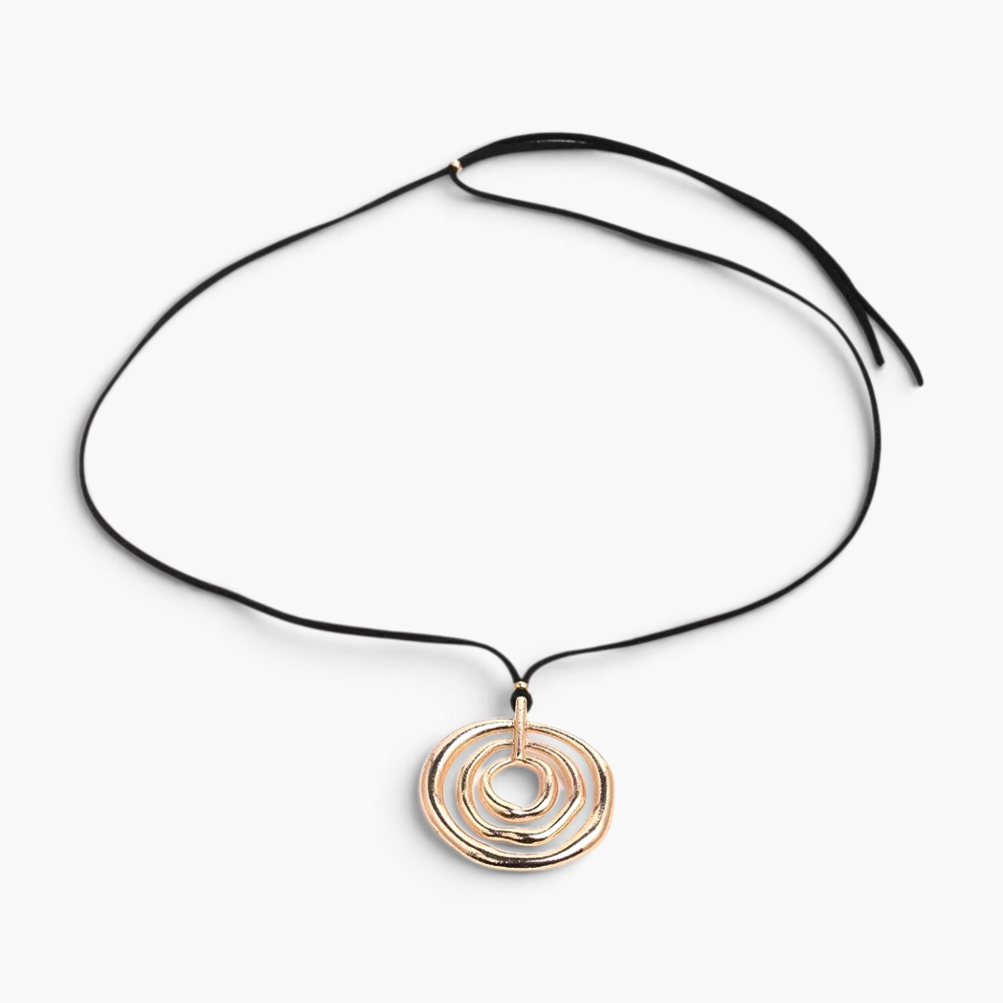 Beach Rose Co. long necklace featuring a gold-plated pendant with nested organic circles on a black PU cord.