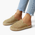 Beach Rose Co. gold crochet-style mesh espadrille mules with braided sole trim worn with cropped jeans.