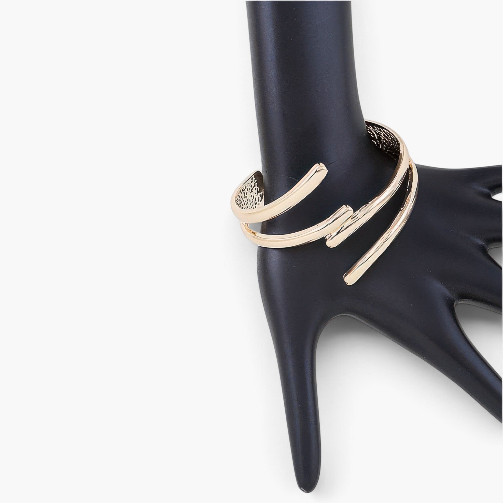Beach Rose Co. Delicate Contact Cuff Bracelet in polished gold with a minimalist open wrap design on a display hand