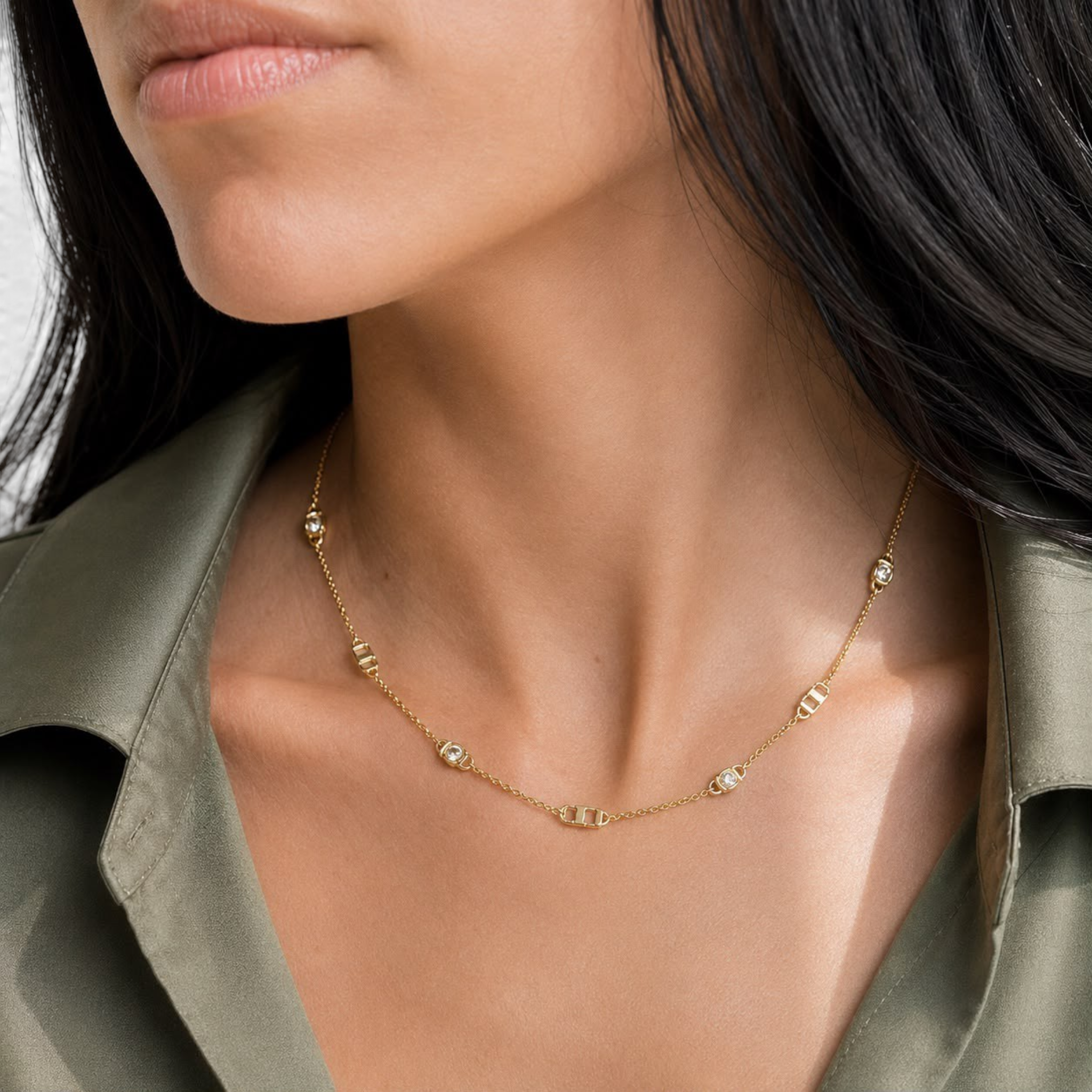 Beach Rose Co. 18K gold filled chain necklace with sparkling cubic zirconia stations worn on a model