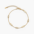 Beach Rose Co. 18K gold filled bracelet featuring delicate chain links, polished accents, and cubic zirconia stations.