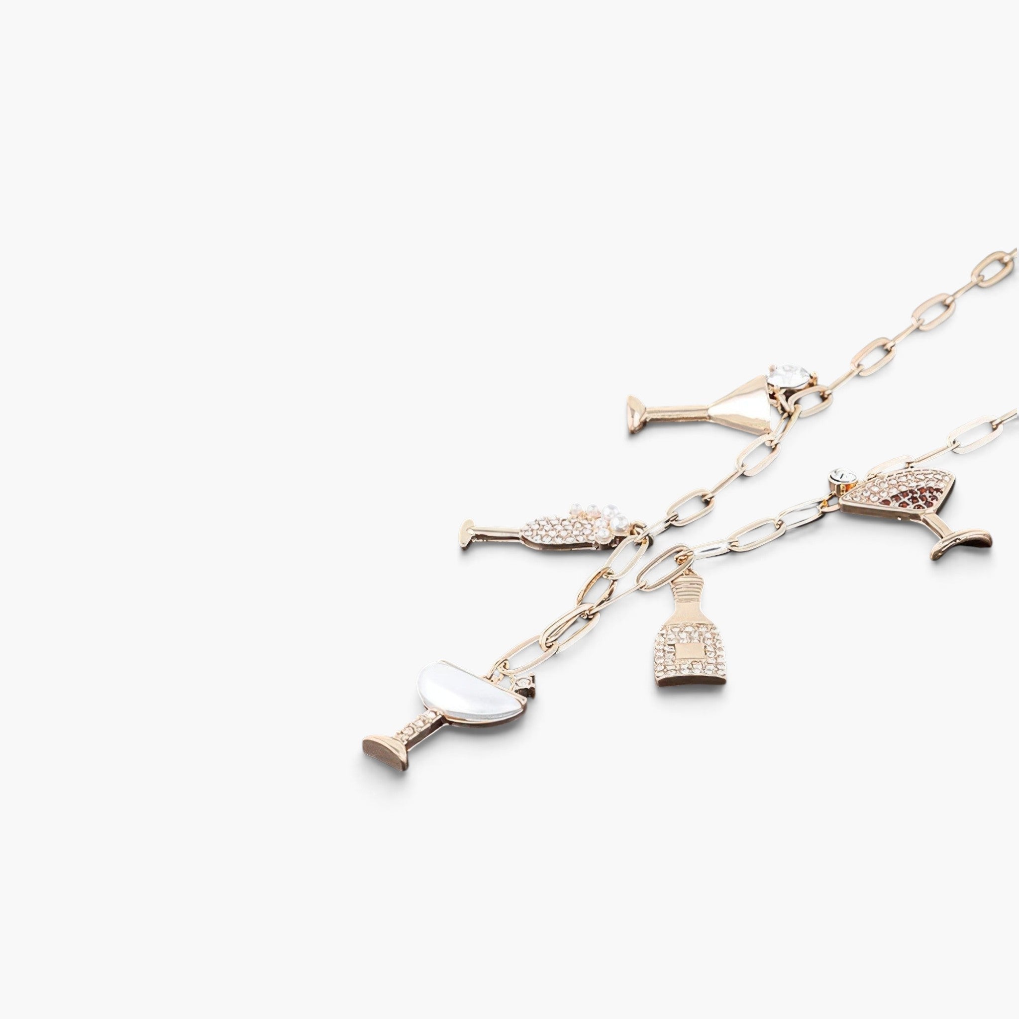 Beach Rose Co. gold chain necklace featuring sparkling party drink charms with clear jewels on a white background