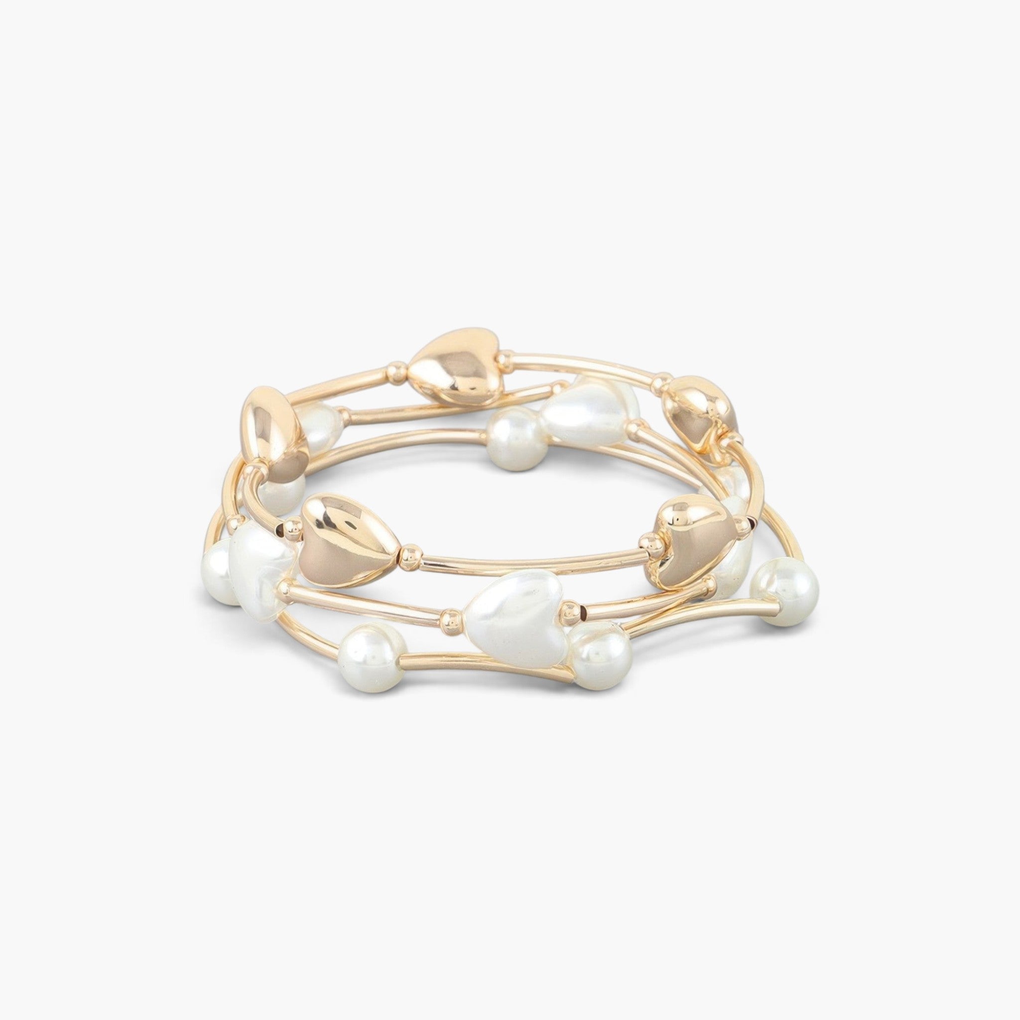 Beach Rose Co. gold cream beaded wrap bracelet featuring delicate heart charms and smooth pearls on a white background.