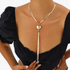 Beach Rose Co. 18K gold-plated necklace featuring a flat herringbone chain, heart pendant, and cascading drop chains.