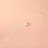 Beach Rose Co. 18K gold-plated necklace featuring a flat herringbone chain, polished heart pendant, and drop chains.