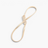 Beach Rose Co. gold metal waist belt featuring a slim ridged band and an intricate interwoven knot buckle design.
