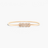 Beach Rose Co. slim gold metal waist belt featuring an intricate interwoven knot buckle and a finely ridged band.