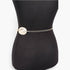 Beach Rose Co. gold metal chain belt featuring shimmering circular discs on a black mannequin torso