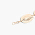 Beach Rose Co. gold metal chain belt featuring shimmering hammered discs and a secure lobster clasp closure.