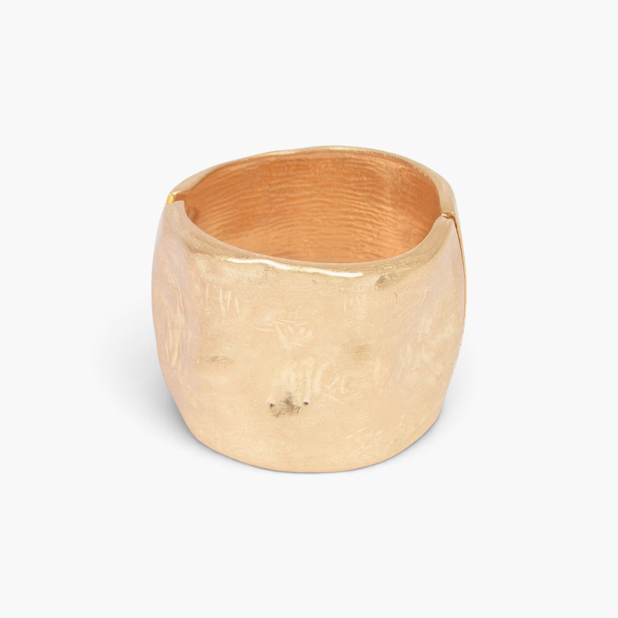 Beach Rose Co. gold cast metal cuff bracelet with a textured surface and convenient spring hinge closure.