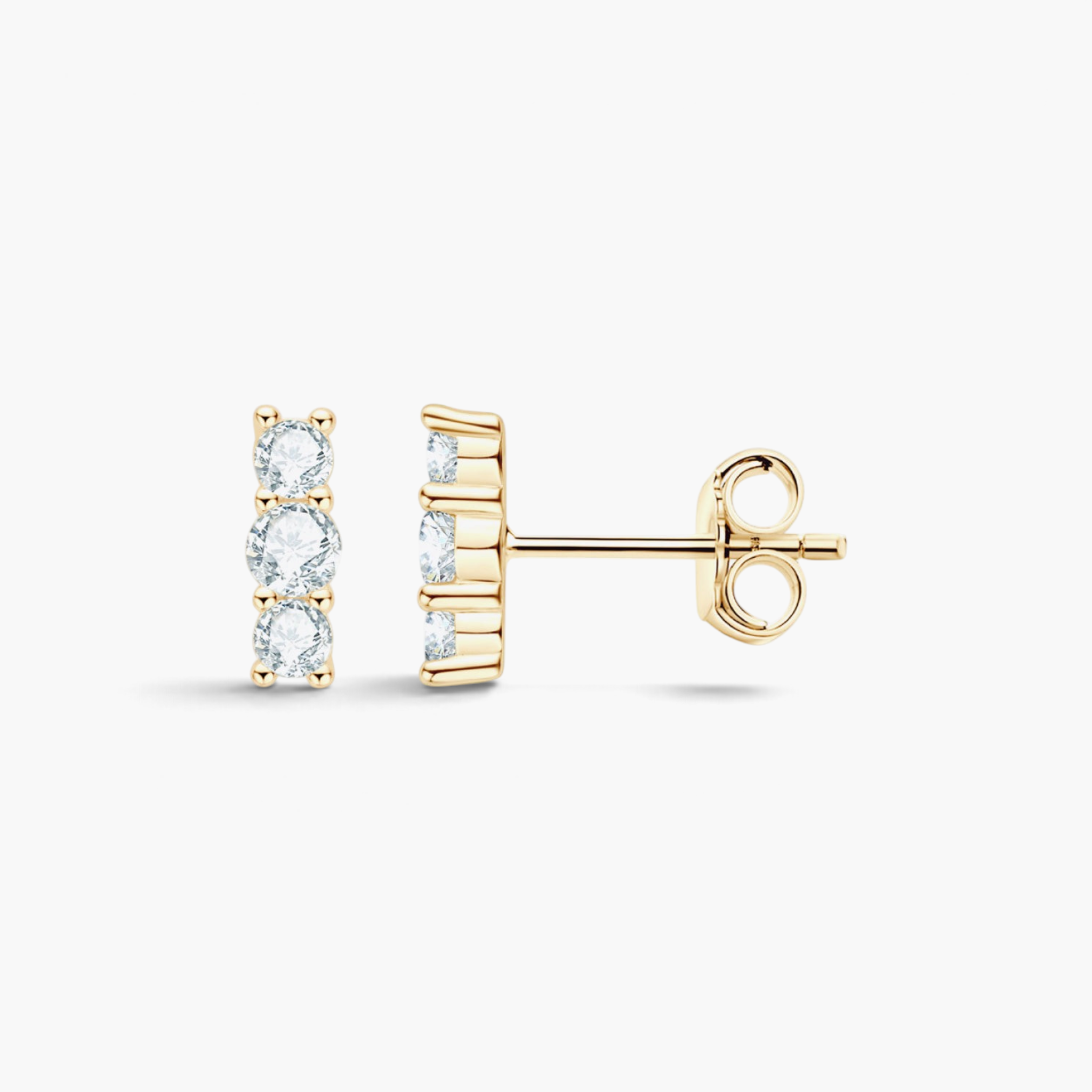 Beach Rose Co. gold-plated sterling silver bar stud earrings featuring three round moissanite stones in prong settings.