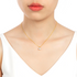 Beach Rose Co. 1 carat round moissanite solitaire pendant necklace in gold-plated sterling silver on a model