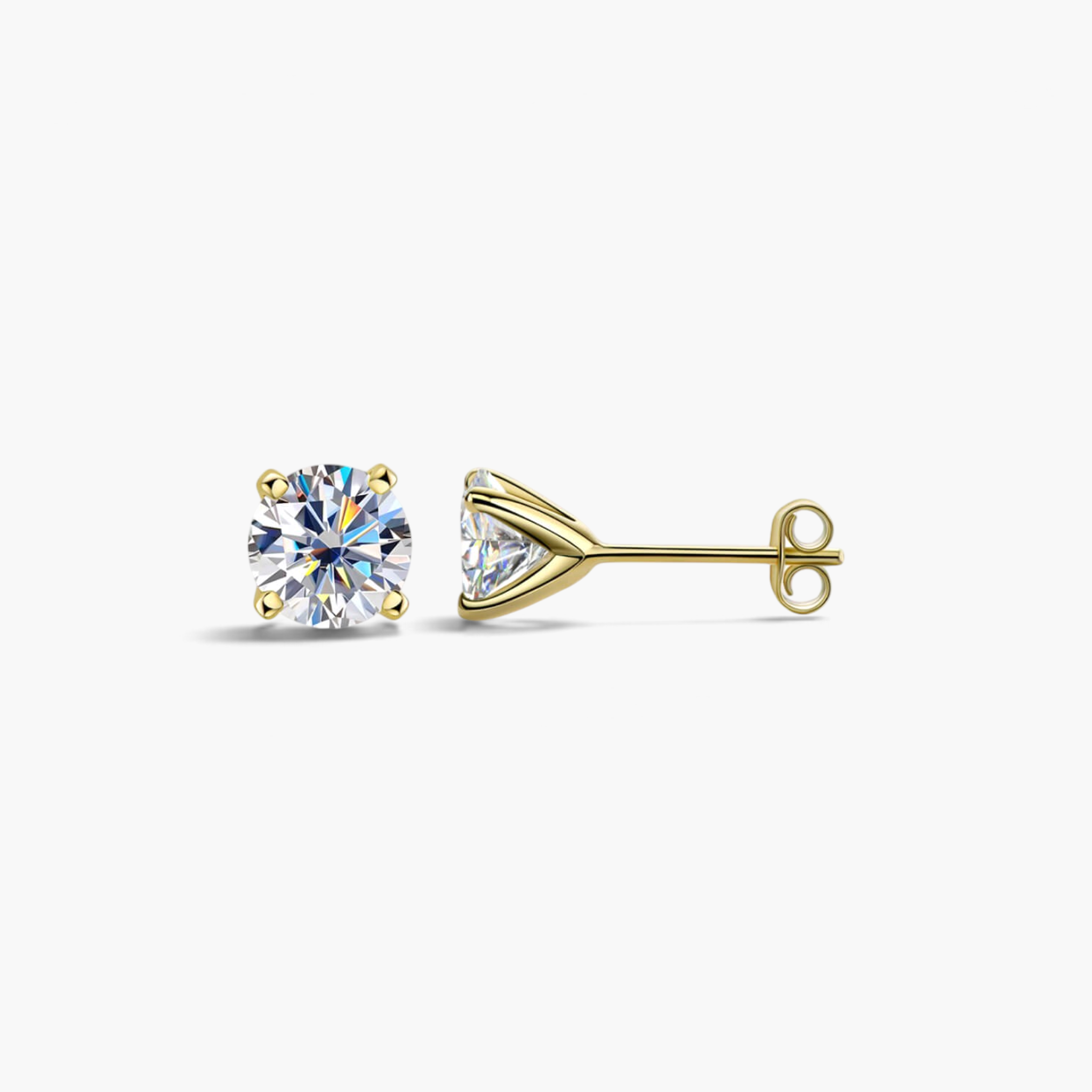 Beach Rose Co. 1 carat round moissanite stud earrings in gold-plated sterling silver with four-prong settings.