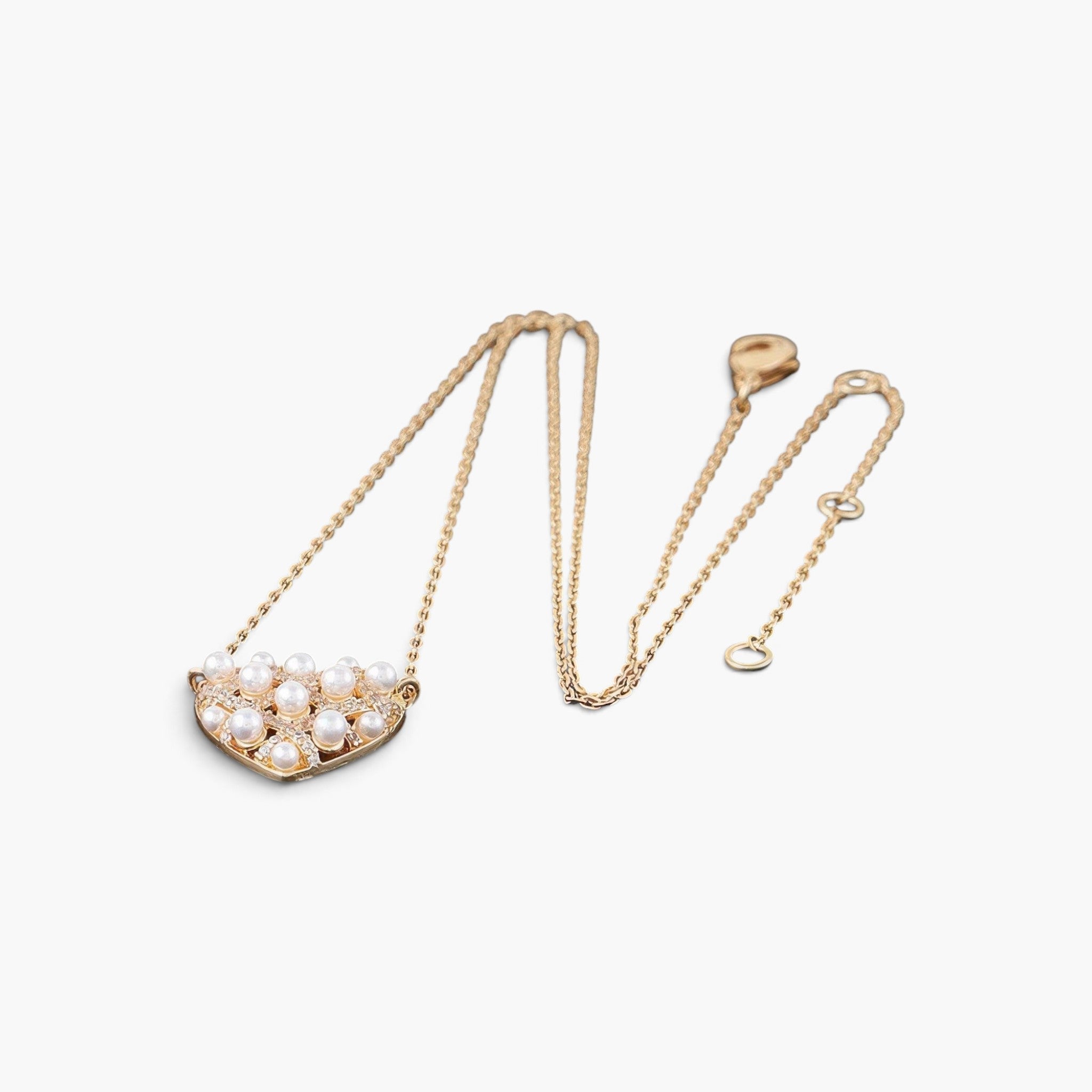 Beach Rose Co. gold quilted heart pendant necklace featuring lustrous white pearls on a delicate chain