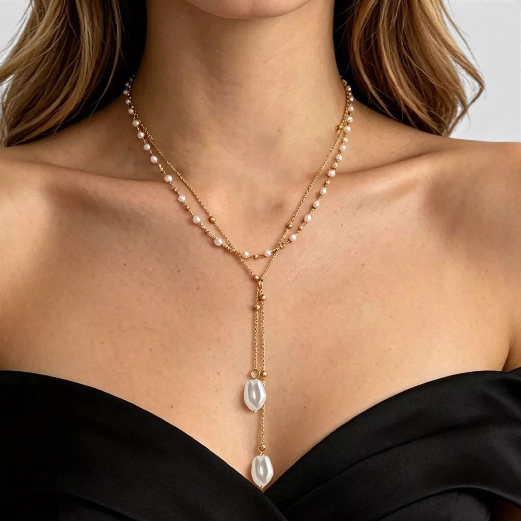 Beach Rose Co. 18K gold-plated layered Y-necklace featuring petite white faux pearls and two irregular pearl drops.