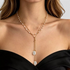 Beach Rose Co. 18K gold-plated layered Y-necklace featuring petite white faux pearls and two irregular pearl drops.