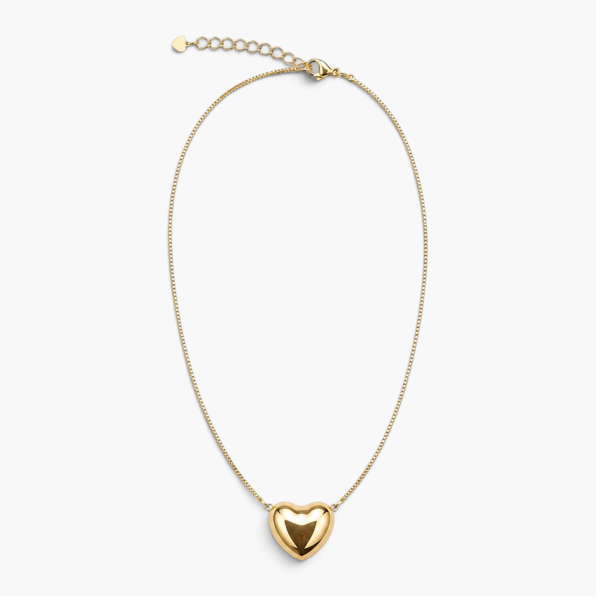 Beach Rose Co. gold puff heart pendant necklace on a delicate chain with a lobster clasp and extender