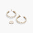 Beach Rose Co. gold double layered hoop earrings featuring sparkling rhinestones next to a coin for size reference.