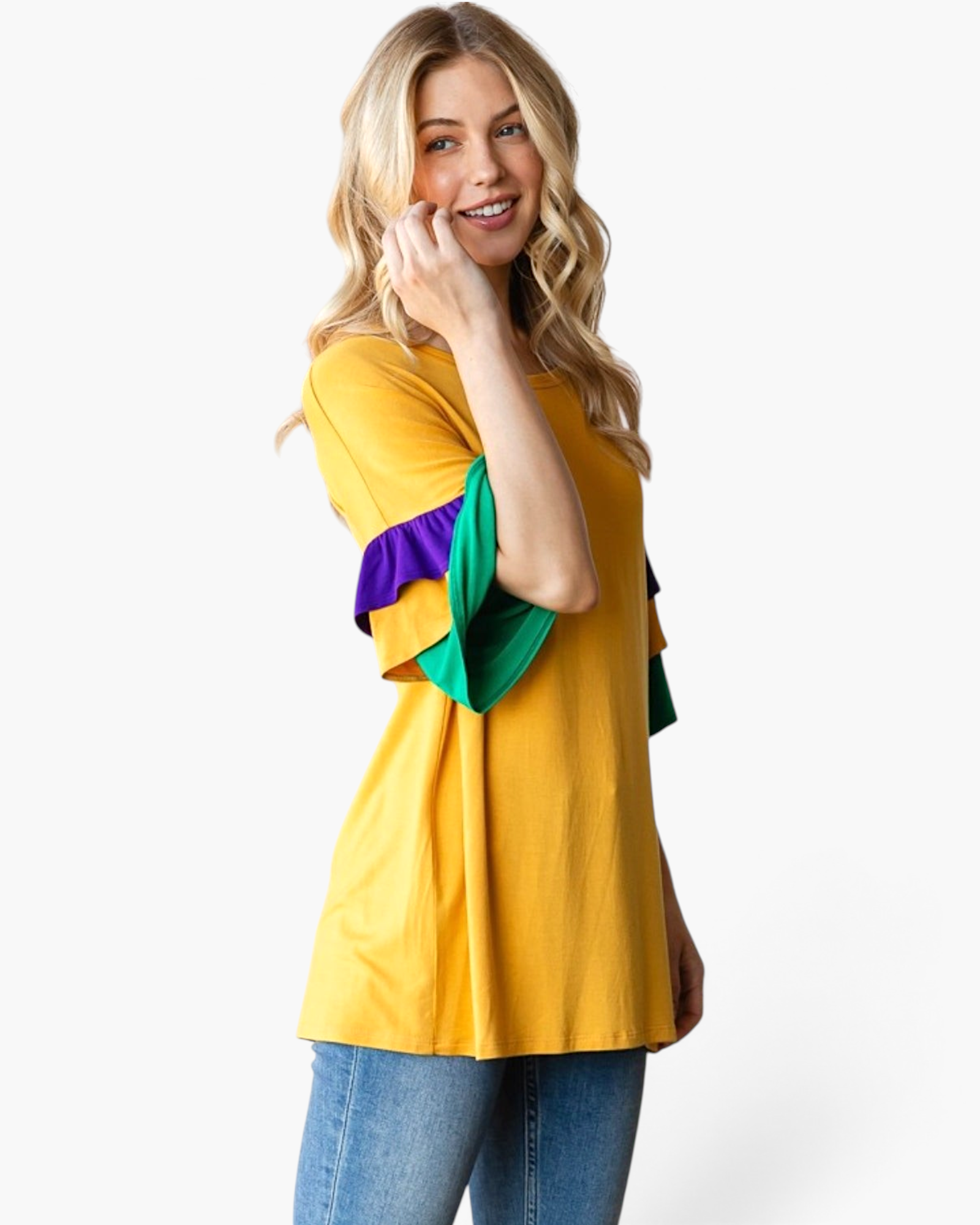 Beach Rose Co. gold top with purple and green color-block layered ruffle sleeves worn by a blonde model.