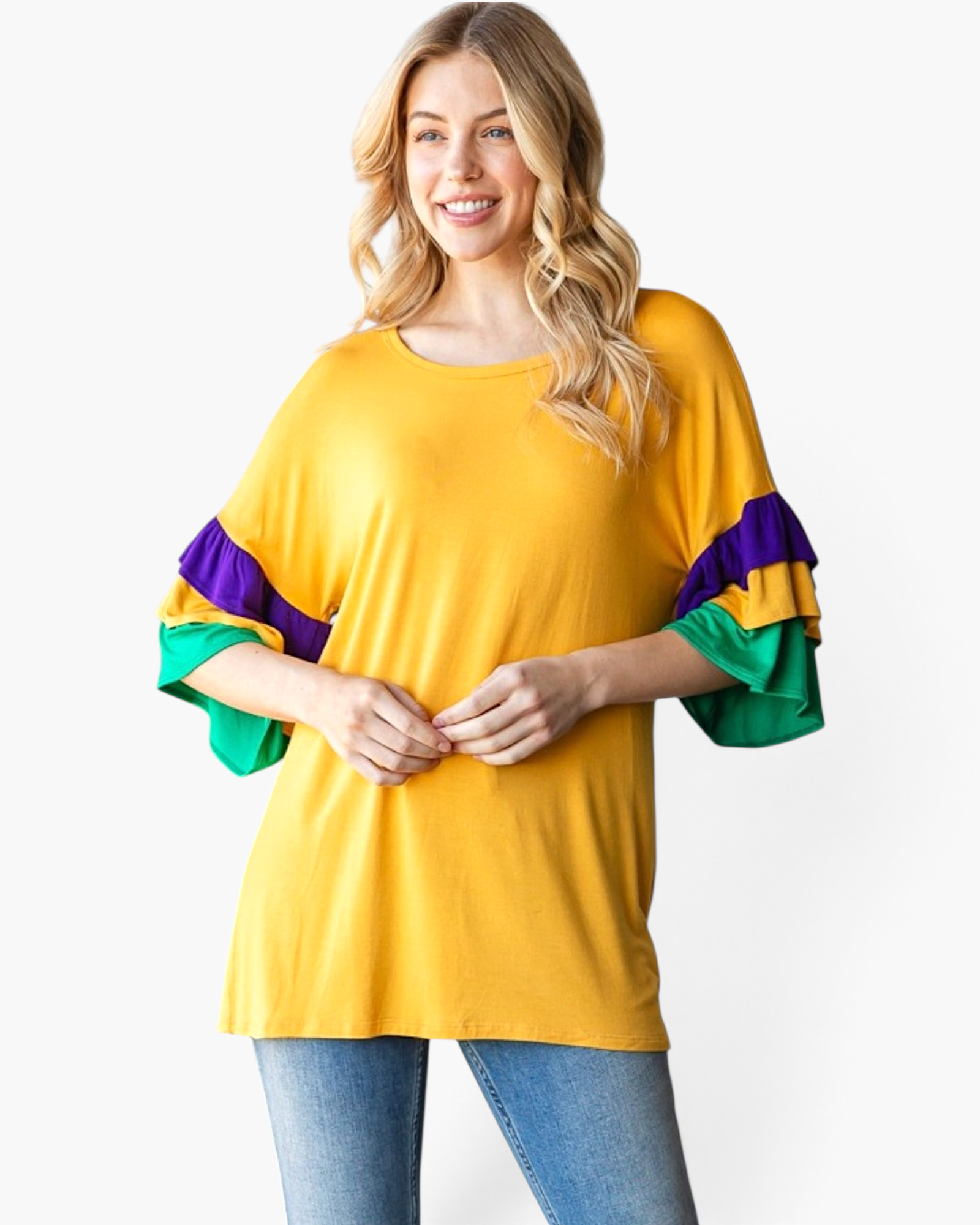 Beach Rose Co. gold top with purple and green layered ruffle sleeves and a relaxed fit worn by a smiling woman.