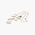 Beach Rose Co. gold chain necklace featuring delicate sea-themed charms including seashells and a seahorse