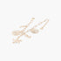 Beach Rose Co. gold chain bracelet featuring dangling starfish, seashell, and seahorse charms for a nautical look.